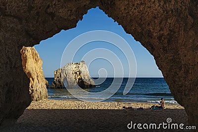 Rock shapes and shilouettes in Three Brothers Beach in Algarve, Portimao, Portugal Editorial Stock Photo