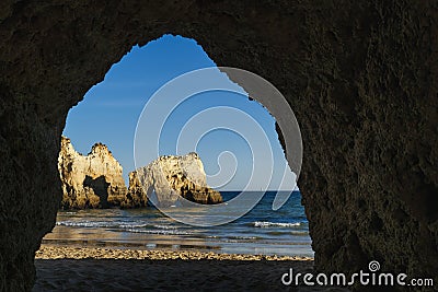 Rock shapes and shilouettes in Three Brothers Beach in Algarve, Portimao, Portugal Stock Photo