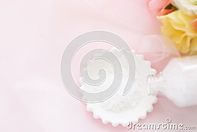 Rock slat on white plate with artificial flower Stock Photo