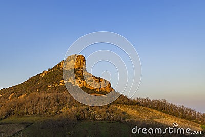 Rock of Solutre with vineyards, Burgundy, Solutre-Pouilly, France Stock Photo