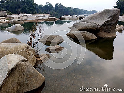 Rock or stone texture in the river landscape background. Stock Photo