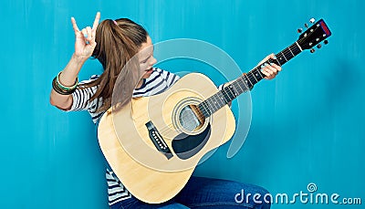 Rock on with teenager girl and guitar music. Stock Photo