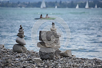 Rock towers built from superimposed stones found on the shore of the lake Constance Stock Photo