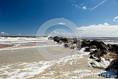 Beach and rocks at Shell Island Stock Photo