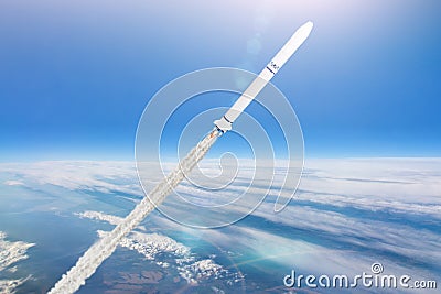 Rocket launch. Flying a spaceship above the clouds in the atmosphere of the Earth Stock Photo