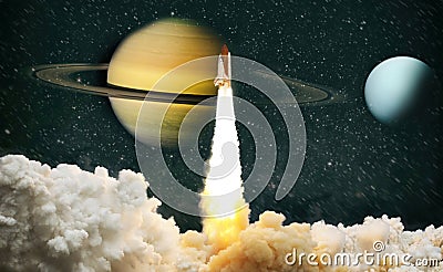 Rockets launch into space on Saturn the starry sky. Rocket starts into space concept.Elements of this image furnished by NASA Stock Photo