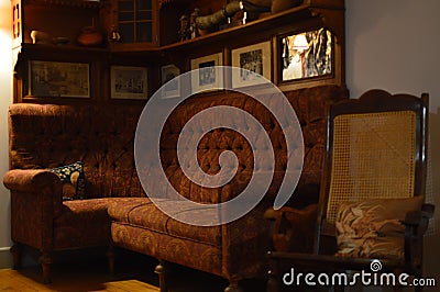 Rocking Chair And Cloth Sofa Of The 50s Part Of A Nice Living Room. Stock Photo