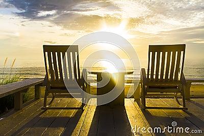 Vintage Rocking Chair at the terrace, Sunrise Huahin Thailand. Stock Photo