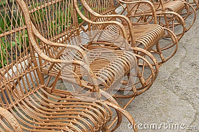 Rocking chairs standing made with withe staning on rough surface Stock Photo