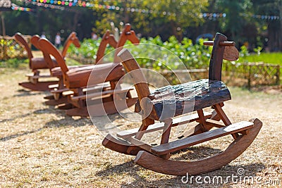 Rocking horse is handmade toys in park, Children like to play fun Stock Photo