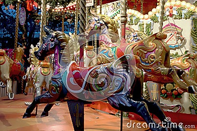 Rocking horses in the Merry go round, Jubilee Gardens South Bank London England - Editorial Stock Photo