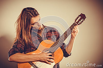 Rockman with his muse. Stock Photo