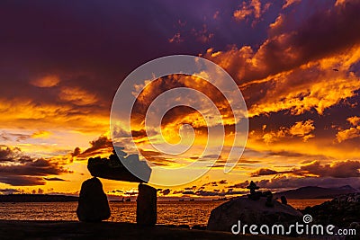 Rocks balance with sunset clouds sky backgrounds Editorial Stock Photo
