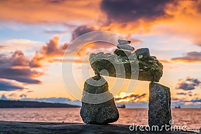 Rocks balance with sunset clouds sky backgrounds Editorial Stock Photo