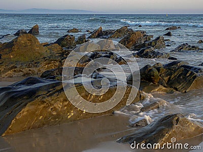 ROCKS ON THE BEACH Stock Photo