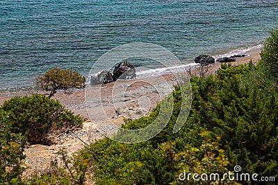 Rocks at the beach of Kiotari on Rhodes island, Greece Stock Photo