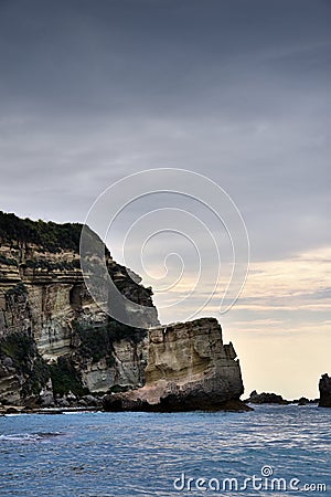 Rocks with caves and grottoes at the beach near Tropea, Calabria Stock Photo