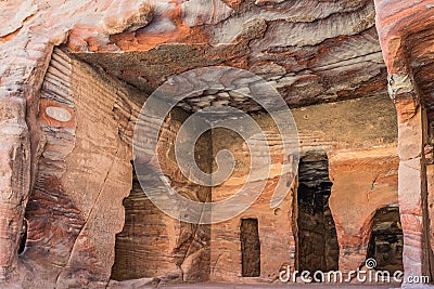 Rocks caves in Nabatean city of Petra Jordan Stock Photo
