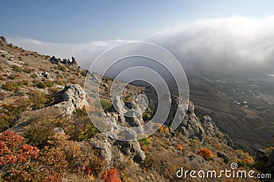 Rocks, fog in autumn Crimea mountains. Landscape. Stock Photo