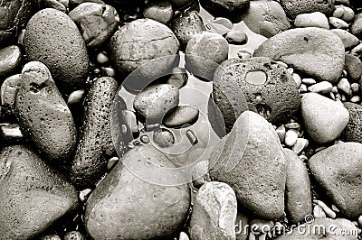 Rocks forming Black Sand Beach on Maui, Hawaii Stock Photo