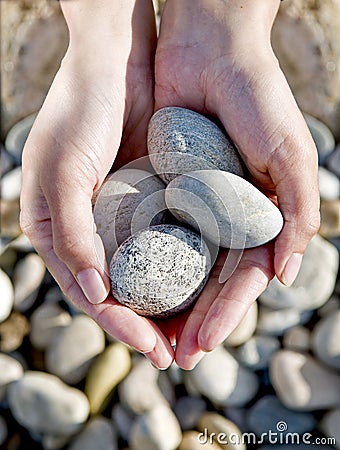 https://thumbs.dreamstime.com/x/rocks-hands-10068161.jpg