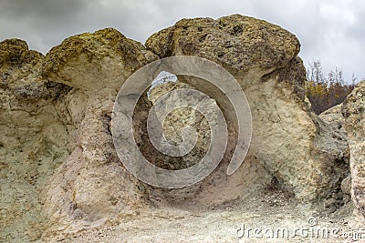 `The Kiss.` Natural phenomenon Stone mushrooms - one of the wonders of Bulgaria in the Rhodope Mountains. Stock Photo
