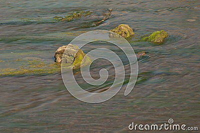 Rocks in the Hiran river at Sasan. Stock Photo