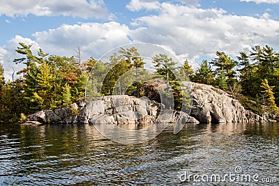 Rocks, trees and water Beausoleil Island Stock Photo