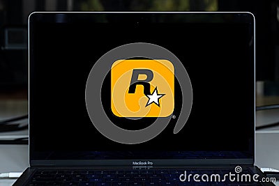 Rockstar games video game design company on screen. Ubisoft Entertainment SA is a French video game company Editorial Stock Photo