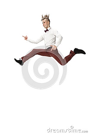 Happy young man dancing in casual clothes or suit, remaking legendary moves of celebrity from culture history Stock Photo