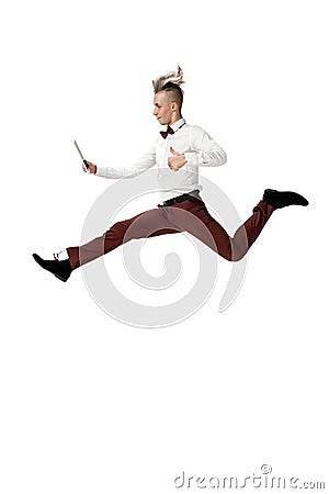 Happy young man dancing in casual clothes or suit, remaking legendary moves of celebrity from culture history Stock Photo