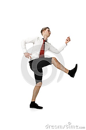 Happy young man dancing in casual clothes or suit, remaking legendary moves of celebrity from culture history Stock Photo