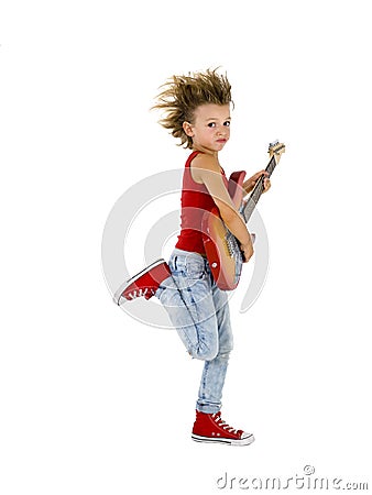 Rockstar kid dances with guitar Stock Photo
