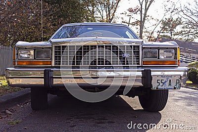 Low angle front view of a white vintage Ford Crown Victoria full size sedan car Editorial Stock Photo