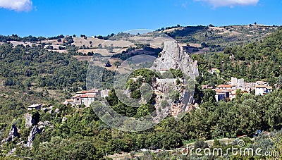 The rocky above the house Stock Photo