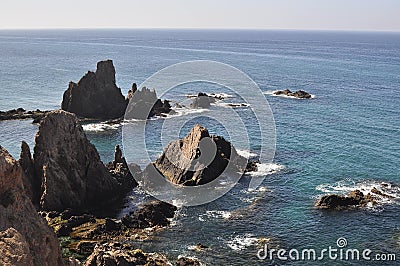 Rocky coastline of Cala de Las Sirenas, Cabo de Gata, Andalusia, Spain Stock Photo