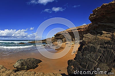 Rocky escarpments at Jarugo beach, west coast of Fuerteventura Stock Photo