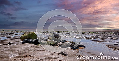 Rocky formation on Alnmouth beach, Northumberland Stock Photo