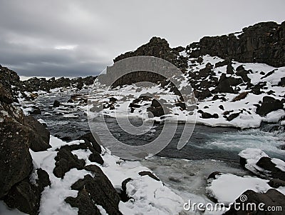 Rocky landscape around the Ã–xarfoss waterfall Stock Photo