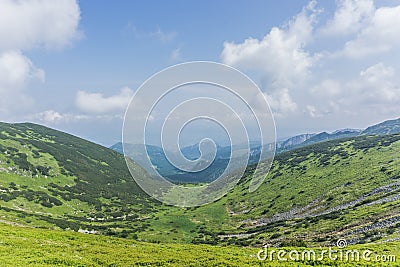 Rocky mountain scenery with beautiful blue sky. Stock Photo