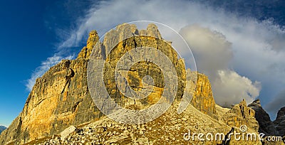 Rocky mountain tower of Dolomites at sunset, Dolomiti di Brenta Stock Photo