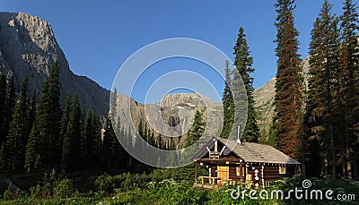 Rocky mountains back country ranger station and falls Stock Photo