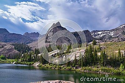 Rocky Mountains Sundial Peak at Lake Blanche hiking trail vista views in summer Wasatch Front, Big Cottonwood Canyon, Salt Lake Ci Stock Photo