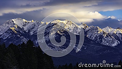 The Rocky Mountans in the setting sun near Fairmont Hot Springs British Columbia Canada in the winter Stock Photo