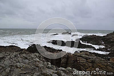 Rocky ocean coast in winter Stock Photo