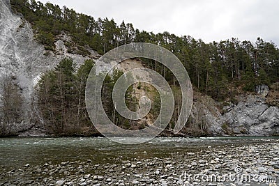 Rocky river bank of Anterior Rhine in Ruinaulta ravine or gorge in Switzerland. Stock Photo