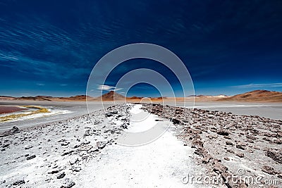 Rocky road among Bolivian desert Stock Photo