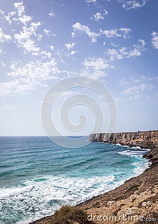 Rocky seashore in sunny Portugal Stock Photo