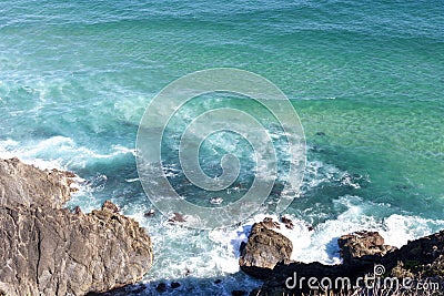 Rocky shore of Australian coastline with crystal clear waters Stock Photo