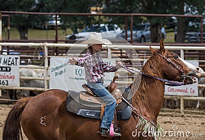 Rodeo Girl Rides Editorial Stock Photo